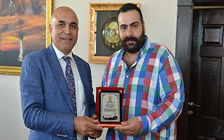 Başkan Korkut'a Berlin'den Plaket Geldi