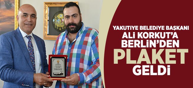 Başkan Korkut'a Berlin'den Plaket Geldi