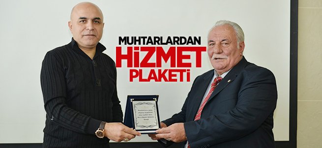 Muhtarlardan Korkut’a memnuniyet plaketi 